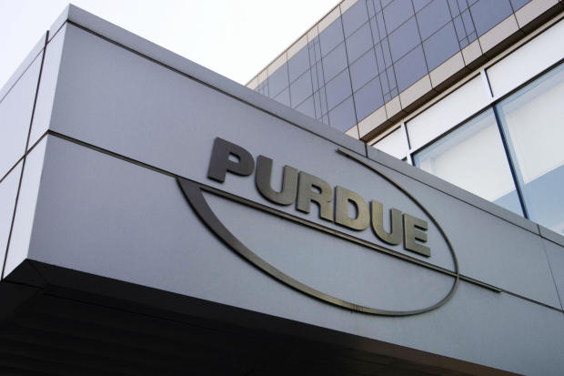 This Tuesday, May 8, 2007, file photo shows the logo for pharmaceutical giant Purdue Pharma at its offices in Stamford, Connecticut. 