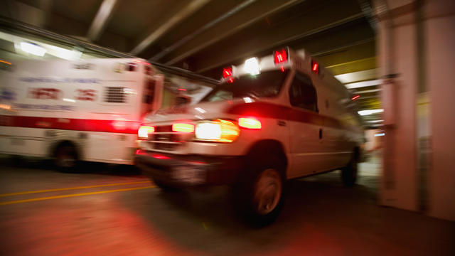 Abstract view of paramedic inside ambulance 