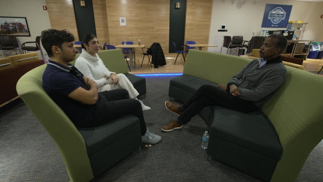 Bill Whitaker with Eden Yadegar and David 