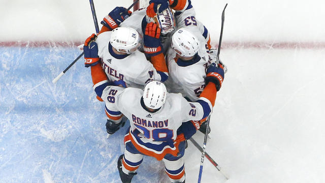 Teammates congratulate goaltender Ilya Sorokin #30 of the New York Islanders after the 4-3 win against the Florida Panthers at the Amerant Bank Arena on December 2, 2023 in Sunrise, Florida. 