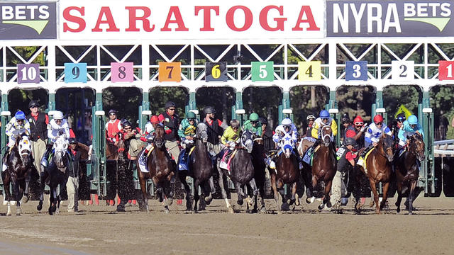 Horses break from the gate at the start of the Travers Stakes horse race at Saratoga Race Course in Saratoga Springs, Aug. 27, 2016. 