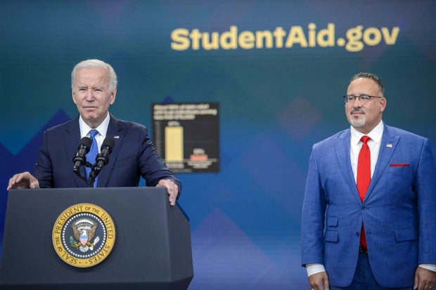 President Biden and Miguel Cardona