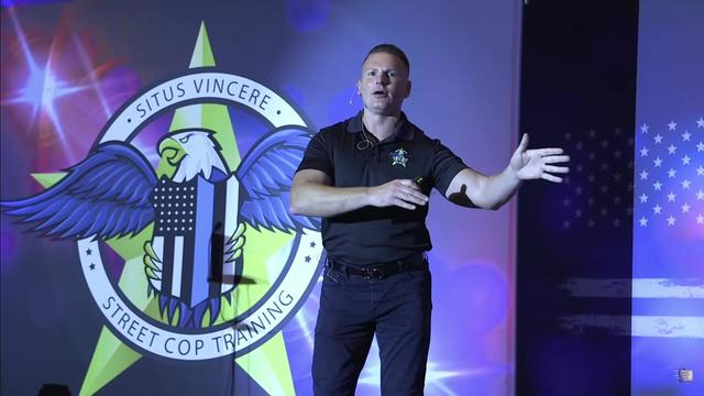Street Cop Training founder and CEO Dennis Benigno speaks at a conference in Atlantic City in 2021. 