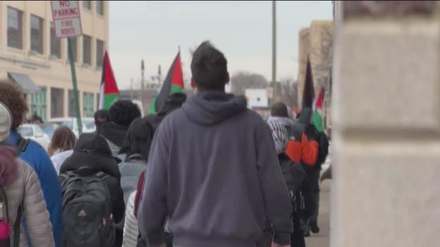 Students protestors march outside of University of Michigan, Wayne State University 