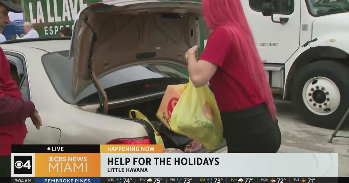 Latin Chamber of Commerce gifting families in need foods for Christmas