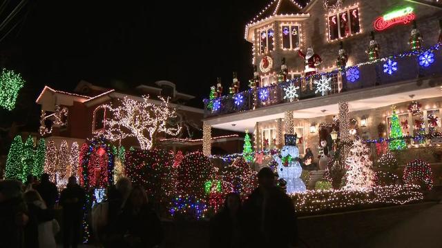 Homes decorated with Christmas lights in Dyker Heights. 