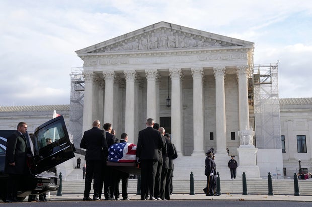 The flag-draped casket of retired Supreme Court Justice Sandra Day O'Connor arrives at the Supreme Court in Washington, Monday, Dec. 18, 2023.