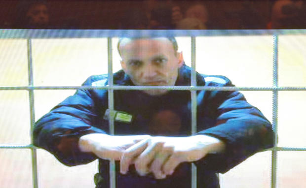 FILE PHOTO: Jailed Russian opposition leader Alexei Navalny is seen on a screen during a court hearing in Moscow 