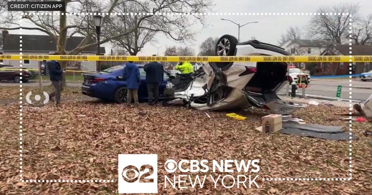 Woman in critical condition after car flipped over in Queens crash ...