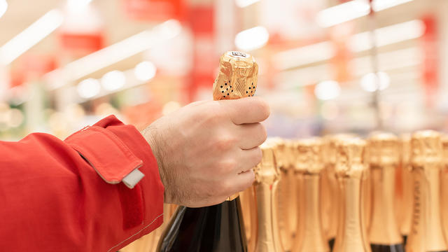 Bottles of sparkling champagne, shop, supermarket 