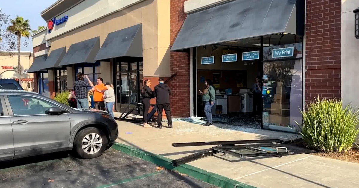 Car crashes through front of Sacramento UPS store