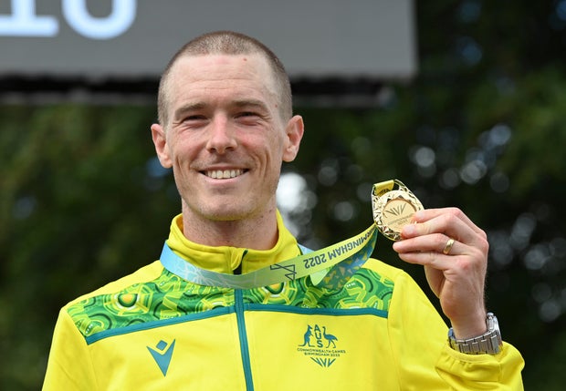 Gold medal winner Rohan Dennis of Australia poses with his medal after the men's cycling individual time trials at the Commonwealth Games in West Park, Wolverhampton, England, on Aug. 4, 2022