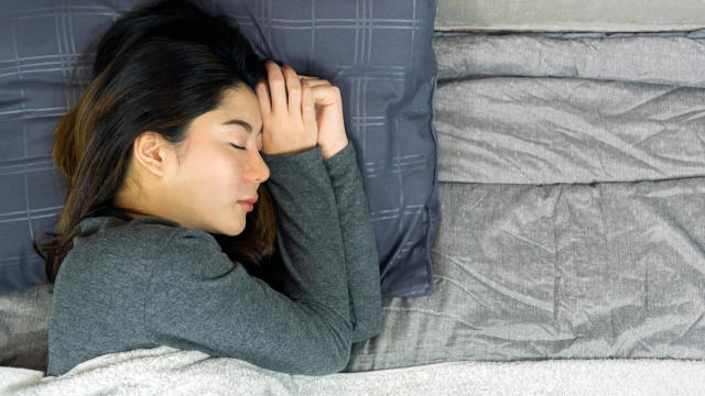 Woman Sleeping in bed 