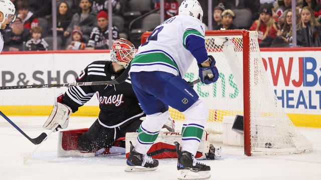 Vancouver Canucks center J.T. Miller (9) scores a goal during a game between the Vancouver Canucks and New Jersey Devils on January 6, 2024 at Prudential Center in the Newark, New Jersey. 