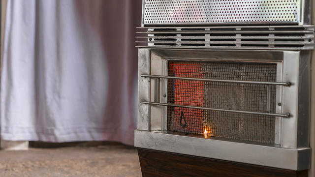 retro style butane heating in old house, space for text, energy saving concept 