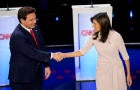 Former U.N. Ambassador Nikki Haley and Florida Gov. Ron DeSantis shaking hands at the start of the CNN Republican presidential debate at Drake University in Des Moines, Iowa, on Wednesday, Jan. 10, 2024. 