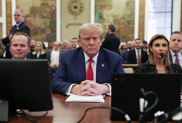Former President Donald Trump sits in a New York courtroom before closing arguments in his civil fraud trial on Jan. 11, 2024.
