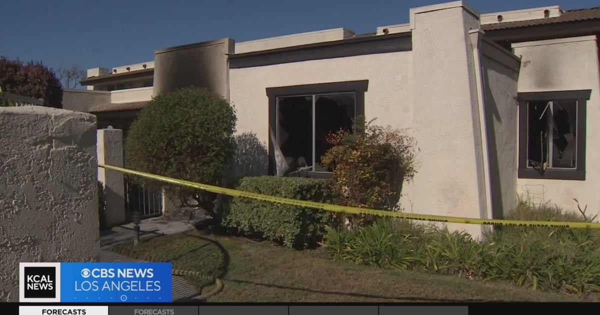 Neighbors rescue woman after fire engulfs her home - CBS Los Angeles