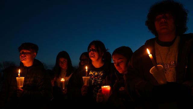 People Attend A Candle Light Vigil At Wiese Park In Perry Iowa 