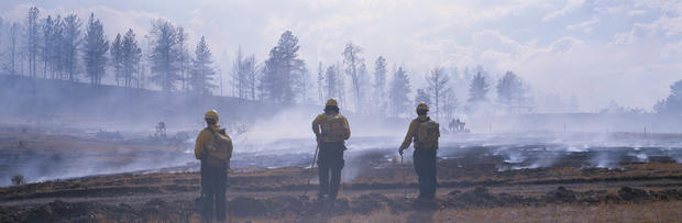 Firefighters on the scene of a smoky wildfire in Montana 