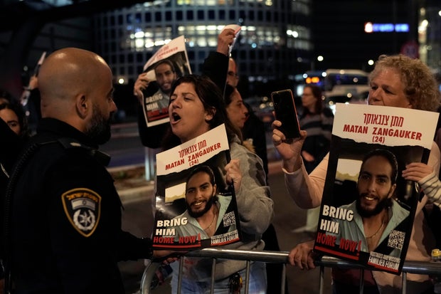 Protesters attempt to block a street during a demonstration to demand the release of the hostages taken by Hamas militants into the Gaza Strip during the Oct. 7th attack, in Tel Aviv, Israel, on Jan. 20, 2024
