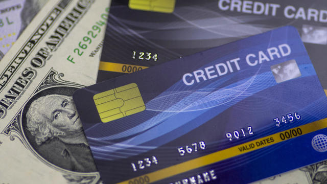 Credit Card on dollar bills as wealthy concept 