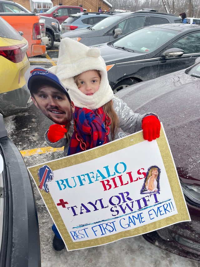 ella-piazza-with-taylor-swift-poster-at-kc-bills-game.jpg