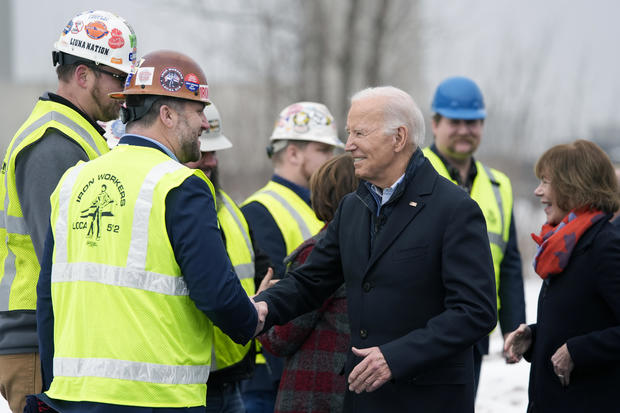 President Biden speaks with ironworkers near the John A. Blatnik Bridge between Minnesota and Wisconsin on Thursday, Jan. 25, 2024, in Superior, Wisconsin. 
