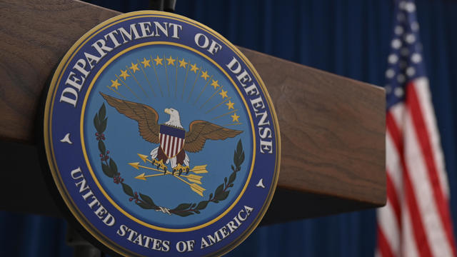 Department of Defense logo and flat at the Pentagon 