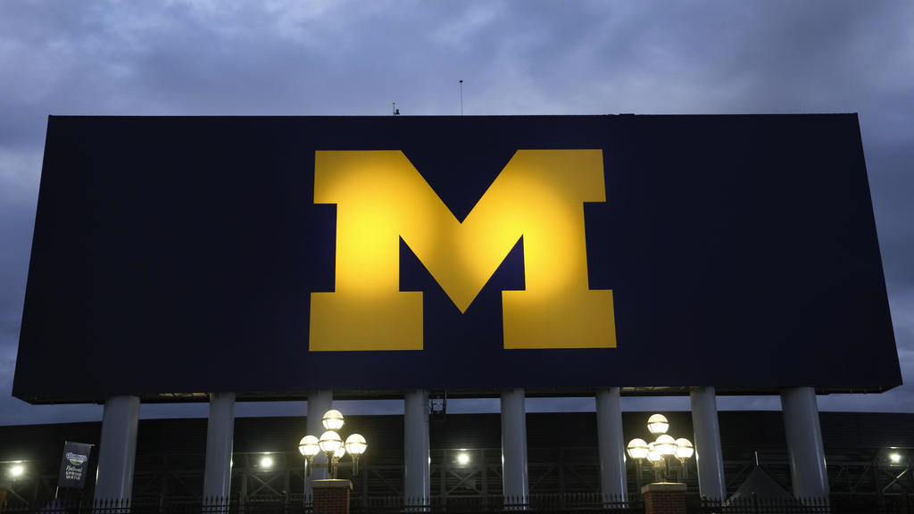 University of Michigan football, NCAA agree on penalties over
recruiting violations