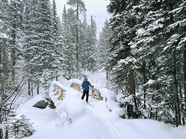 courtesy-rmnp-a-park-visitor-is-cross-country-skiing-in-rocky-mountain-national-park.jpg 