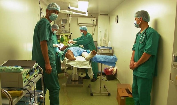 Doctors work on a patient at a field hospital in Rafah, in the southern Gaza Strip, Feb. 4, 2023