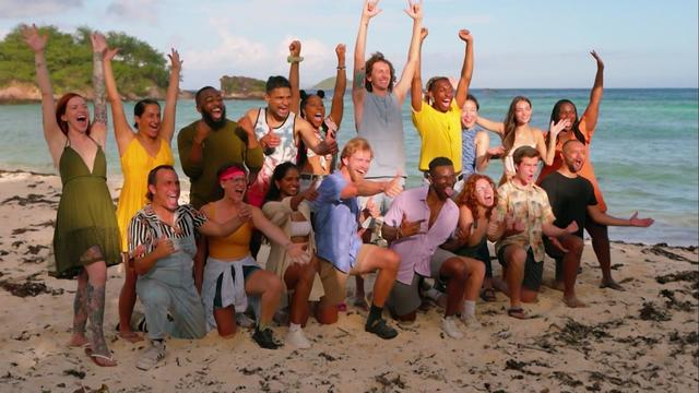 The 18 castaways from "Survivor" season 46 pose on a beach in Fiji. 