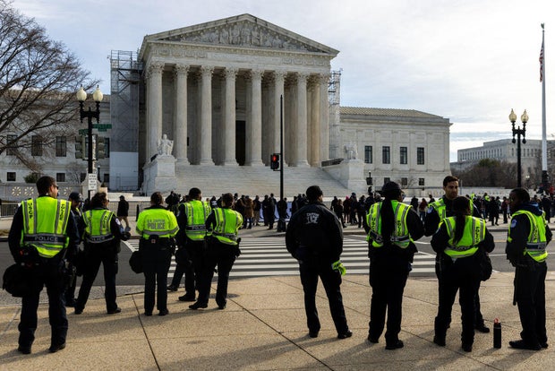 Police officers stand outside the Supreme Court on Feb. 8, 2024, in Washington, D.C.
