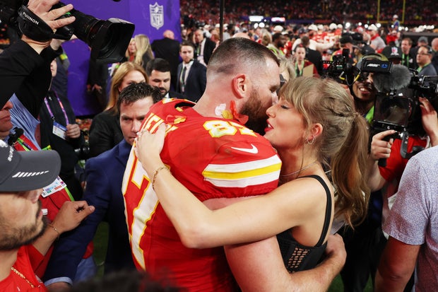 Travis Kelce #87 of the Kansas City Chiefs and Taylor Swift embrace after the Chiefs defeated the San Francisco 49ers in Super Bowl LVIII