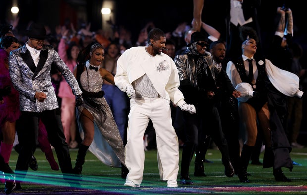 Usher performs during the Apple Music Super Bowl LVIII Halftime Show