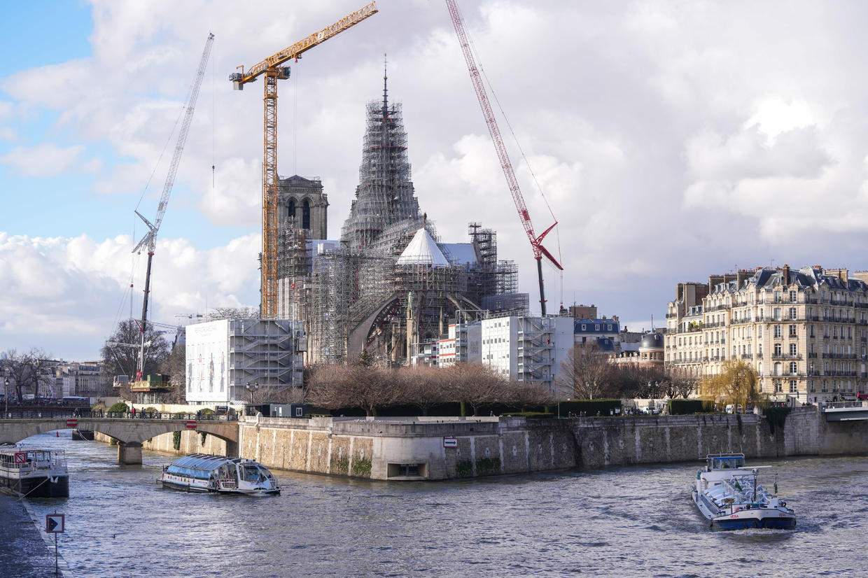 Notre Dame's new spire revealed in Paris, marking a milestone in ...