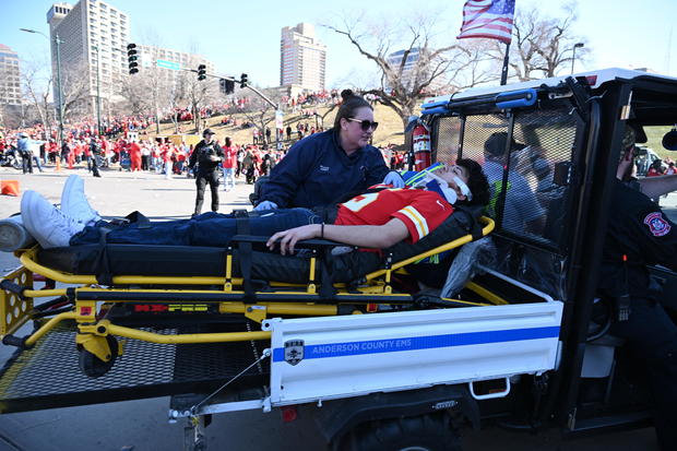 A person received medical attention after shots were fired near Union Station in Kansas City, Missouri, after the Chiefs' Super Bowl victory parade on Feb. 14, 2024. 