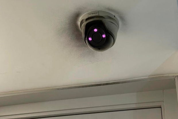 This undated image provided by Sanna Rameau, shows paint obscuring a building's security camera where Ana Maria Knezevic was staying in Madrid