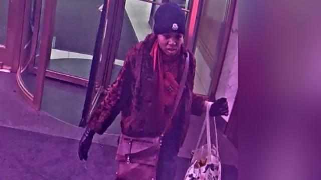 Surveillance footage showing a woman accused of assaulting a man inside a subway station. 