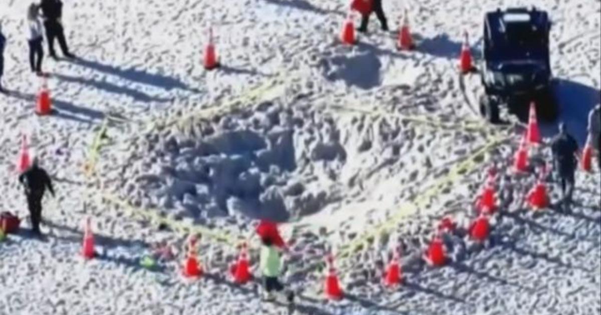 Man says he saw man digging "massive sand hole" that trapped children in Lauderdale-by-the-Sea