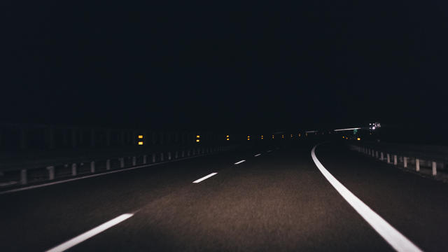 Italy, Udine, driving at night along the highway 