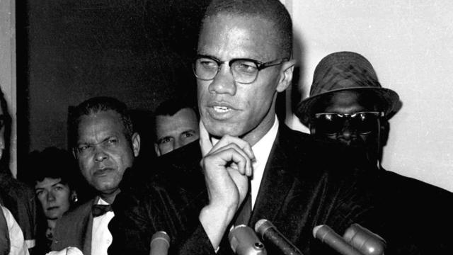Malcolm X speaks to reporters in Washington, D.C., May 16, 1963. 