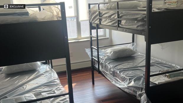 Two sets of bunk beds inside an apartment. 
