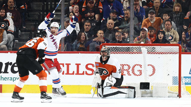 Erik Gustafsson #56 of the New York Rangers reacts following a goal by teammate Alexis Lafreniere #13 (not pictured) scored past Samuel Ersson #33 of the Philadelphia Flyers during the second period at the Wells Fargo Center on February 24, 2024 in Philadelphia, Pennsylvania. 