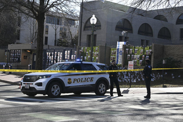 Police investigate the crime scene after a man set himself on fire in front of the Israeli Embassy in Washington, D.C., on Feb. 25, 2024. 