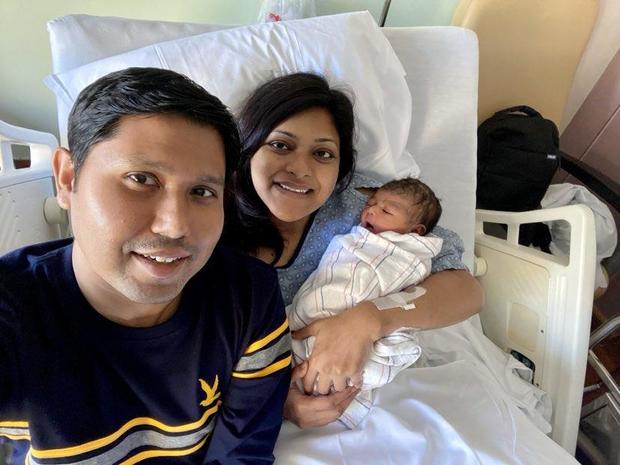 Nabil Haque and Sungida Rashid with their newborn daughter 
