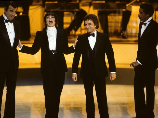 From left, Walter Matthau, Liza Minnelli, Dudley Moore and Richard Pryor are seen hosting the Academy Awards, April 11, 1983.