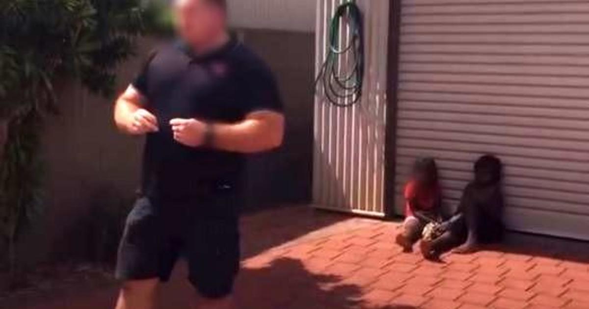 An Australian man who allegedly bound the hands of young Aboriginal children has been charged with assault