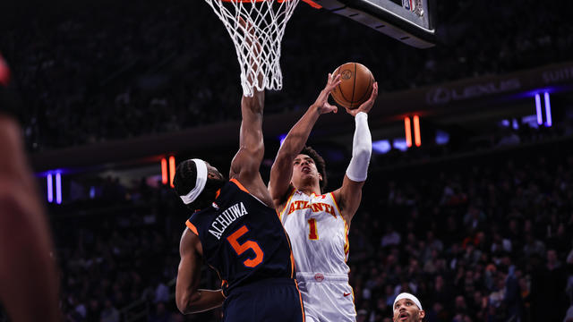 Jalen Johnson #1 of the Atlanta Hawks is guarded by Precious Achiuwa #5 of the New York Knicks during the first quarter of the game at Madison Square Garden on March 05, 2024 in New York City. 